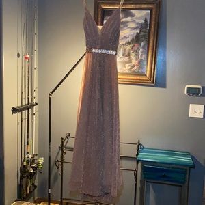 This is a Cinderella Divine dress and it is a size 12